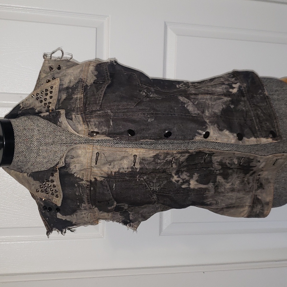 Distressed studded vest